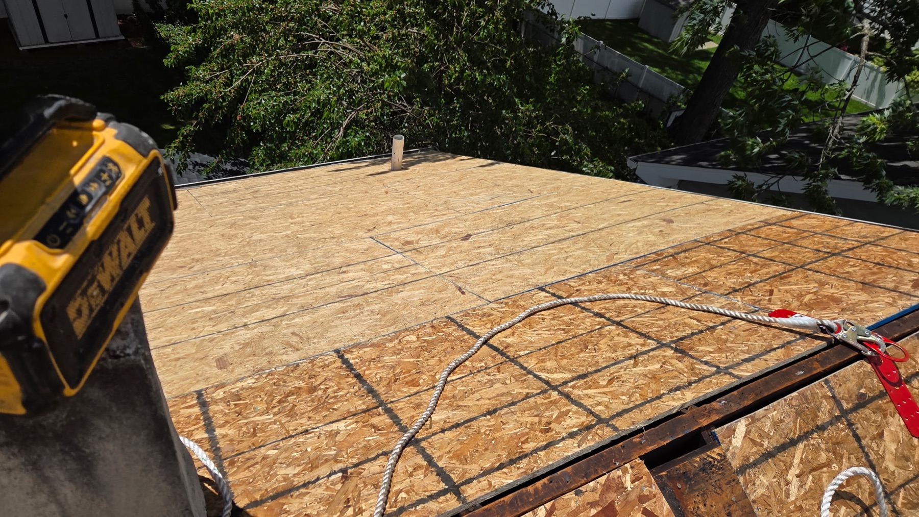 New plywood roof decking with chalk-lined nailing pattern during a Richwood, NJ roof replacement